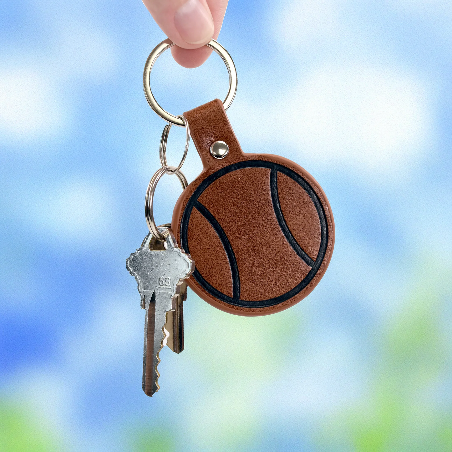 Racquet Inc Leather Tennis Ball Keychain